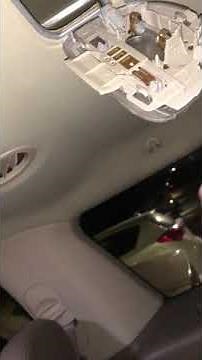 Remove your rear dome light lens 2005 Ford Explorer