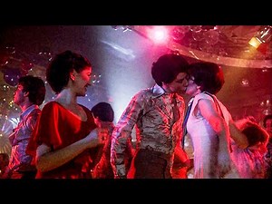 Travolta takes over her heart and the dancefloor (Night Fever - Bee Gees)