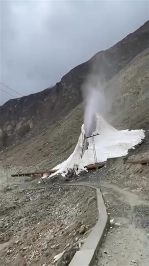 A unique process in the world in Gilgit-Baltistan! In winter, people throw water into the air, which immediately freezes into ice. This technique is used to store water so that crops can be irrigated when it melts. Amazing natural sight! ❄️ | Daily Ausaf Gilgit Baltistan