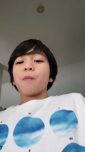 Dancing and Snacking in a Modern Kitchen