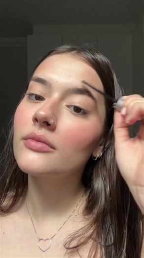 Makeup Application Tips in a Cozy Bedroom Setting