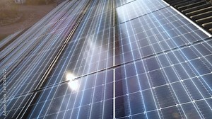 Electricity moving through solar panels on a house roof - CGI Visualization