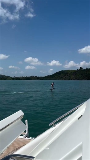 Indian millionaire girl enjoying on surf board