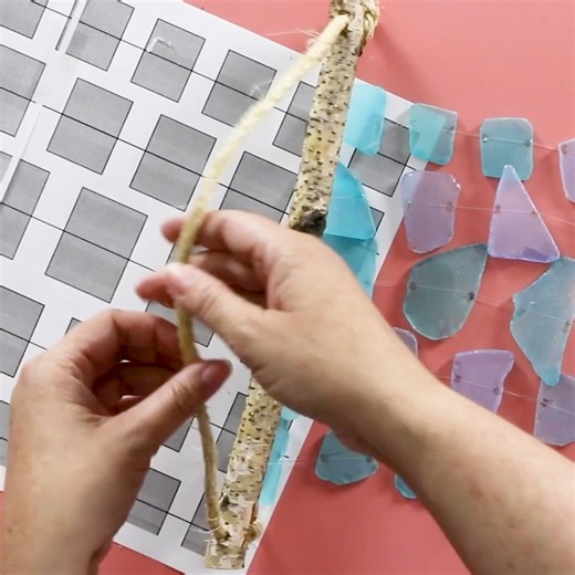 Make beautiful sea glass wind chimes! 🌊✨ Grab the free template and DIY! 🎶💙 https://thecraftyblogstalker.com/diy-sea-glass-wind-chime-craft-kit/ | The Crafty Blog Stalker