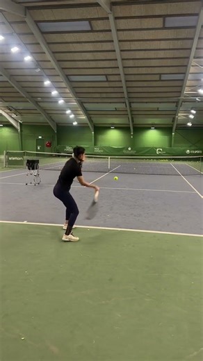 Training on the transition between ball control feel and racquet head acceleration during the swing