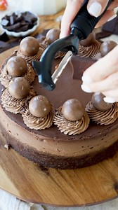 This Chocolate Cheesecake is incredibly rich and creamy. Chocolate crust, with a decadent chocolate filling, topped with a silky chocolate ganache, and chocolate whipped cream. The cheesecake is decorated with chocolate truffles and chocolate shavings, making a stunning presentation for a delicious dessert. 🍫 Check out this amazing recipe here: https://www.piesandtacos.com/chocolate-cheesecake/ | Pies and Tacos