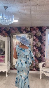 10K views · 51 reactions |  This dress is a beautiful light blue dress with a floral pattern featuring shades of blue and white flowers. The dress has a one-shoulder design with a dramatic ruffled detail over the shoulder and down the bodice, giving it a glamorous and flowing look that suits most ladies shapes.. this dress is also a perfect dress for a wedding abroad.. Call to book your appointment on 02837515177. | Gasp Boutique | Facebook