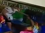 Nursery teacher caught on CCTV beating a child for 'eating slow'