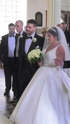 Bride walks down the aisle