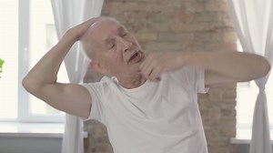 Old Man Stretching And Exercising At Home | Free Stock Video Footage