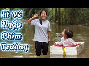 Tieu Phuong Takes Her Grandchildren to Experience the Flood Season