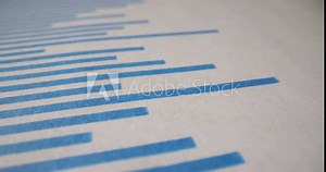Graphics of monthly salaries of company. Business analysis for meeting in conference room. Paperwork with salaries analysis