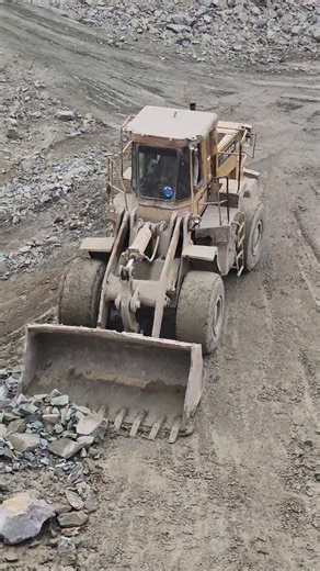 Truck Care TV on Instagram: "Caterpillar 966E: Silent Power in the Rugged Mountains! The future has arrived in the high peaks! Watch the Caterpillar 966 Compact Electric Wheel Loader take on the toughest mountain terrain without breaking a sweat—or emitting a single gram of CO2. ​About This Video: In this video, we’re putting the CAT 966E to the ultimate test. Moving rocks and navigating steep mountain paths, this electric powerhouse proves that you don't need a diesel engine to get the job done