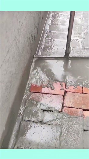 Pouring concrete over bricks to create a solic new floor #contructions #concretework #short