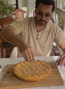 Crunchy Juicy Baklava cheesecake Recipe Ingredients: Phylo sheet/Dough Flour 500gm Oil 70gm Salt 4gm Water 200-250gm Cheesecake layer * cream cheese 500 gm (room temperature) * granulated sugar 50-60gm * cornstarch 200gm * large eggs 1 room temperature Honey syrup * water 250gm * granulated white sugar 300gm * honey 100gm * lemon 2 Melted Butter 140gm for glossing the sheets. Bake time 45-60 minutes at 150-160 degree. For detailed recipe go to my Youtube https://youtu.be/qj6ThzKdjCQ | Adeel Chau