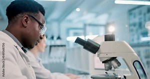 Scientist, black man and microscope or writing in laboratory for results on medical research and experiment. Notebook, professional and expert with notes on science development, study review and info