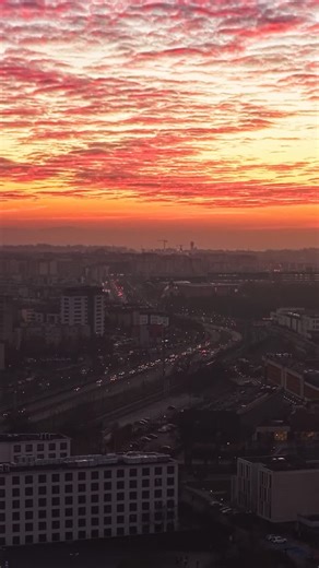 Adrian Augustyn | Photographer | Drone Pilot | Krakow | Poland on Instagram: "Beautiful things are all around us 🥰 The burning sky 🔥, full of pink and orange hues, reflects on the calm water 🌊, creating a magical scene. #krakow #drone #sunset #goldenhour #cracow"
