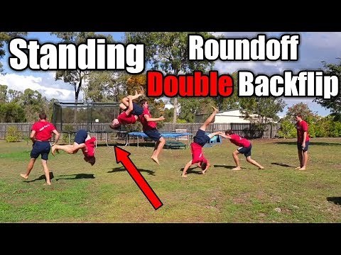 STANDING ROUNDOFF DOUBLE BACKFLIP ON GRASS (16 YEARS OLD)