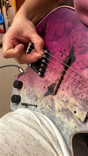 Intonating a Padalka headless bridge. You can do it under full string tension.