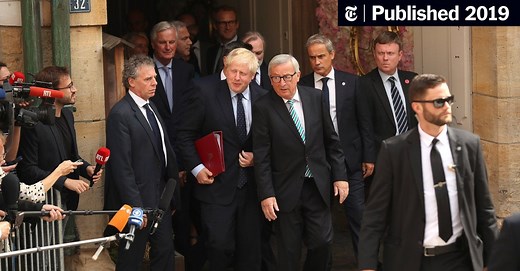 A Brexit Protest, Reporters With Questions, but No Boris Johnson