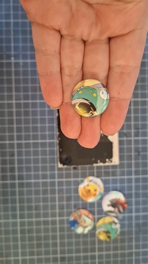 SPEEDRUN A BUTTON WITH ME Last year I started making buttons by using empty Pokémon boosterpacks. They have such lovely illustrations and it's a shame to just dump them in the bin. Not all boosterpacks will fit in a button, but I am working on a second idea for this boosters | Mindspace Paints