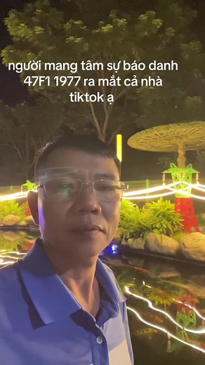 Serene Outdoor Night Scene with Koi Pond Lighting