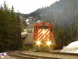A westbound loaded grain train is observed at the lower spiral tunnel on Canadian Pacific's Kicking Horse Pass. We also see an upgrade unit sulpher train at Yoho. From the GSVP show "Canadian Pacific's Kicking Horse Pass" https://rfd.video/CPKickingHorse | Railfan Depot