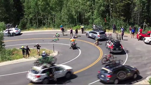 Dramatic video: A biker slams into a car during the Tour of Utah race, setting off a terrible chain reaction. #CBSEveningNews | CBS Evening News