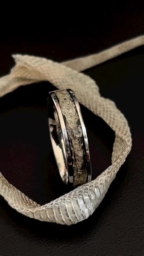 check out this insane snakeskin ring!🐍 steve the snake contributed towards this one, we used his shed to make the coolest ring for a customer’s husband! the skin is inlayed over top of. | Mika Sanga