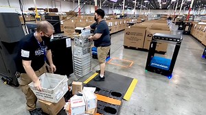 Postal Service rolls out robots to help meet holiday demand
