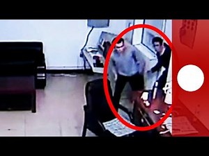 Prison break on tape: 3 men escape after attacking guard in China