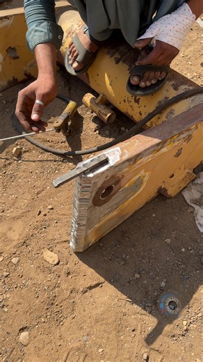 Welding a Caterpillar Loader Boom Joint