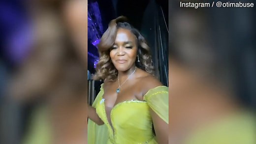 Oti Mabuse puts on a busty display in sensational plunging canary yellow gown