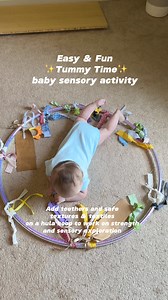 Easy Sensory Baby Activity: Hula Hoop ExplorationIntroducing sensory activities to your baby can significantly help their development. One engaging and easy sensory activity you can make at home with a hula hoop and different teethers and textured items. This simple setup offers sooo many benefits:➡️1. Neck and Head Strengthening: Placing your baby inside the hula hoop encourages them to lift their neck, roll around, and turn their head from side to side. These movements help build neck strength