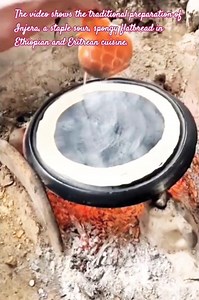 Traditional Injera Making: From Teff Batter to Spongy Flatbread on a Clay Mitad over Open Fire