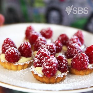 If you’ve ever wanted to make those little tarts that you see at the best patisseries, which look as though they’re studded with jewels, then this recipe is for you – perfect mouthfuls of delicious custard cream & fresh raspberries. #FromTheFoodVault sbs.com.au/food/recipes/mini-raspberry-tarts | SBS Food