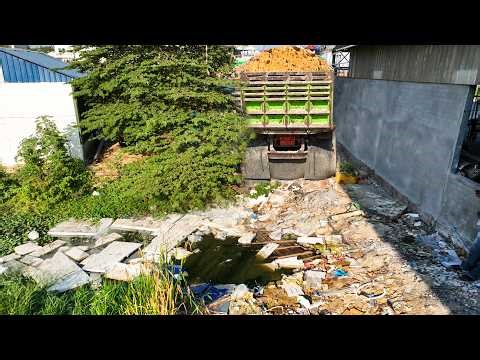 Full Operation Filling Up Land Using Skill Bulldozer Push Soil Into Dirty Flood With Dump Truck 5ton