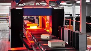 Automated warehouse with barcode scanning system