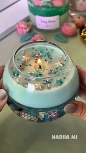 Dreaming of the ocean? 🌊 This handmade water candle brings sea vibes to your space with tiny shells, pearls & calming ASMR energy 🕯💙 ⠀ Created with love and coastal inspiration 💫 ⠀ Tag someone who needs this vibe 💌 ⠀ #asmr #diy #cozyvibes #candles #reels #candlemaking #handmade #craft . . . . . . . . . . . . . . water candle, ocean candle, candle diy, diy candle, aesthetic candle, relaxing diy, asmr candle, handmade decor, coastal vibes, beach vibes, cozy vibes, satisfying, crafted with lov