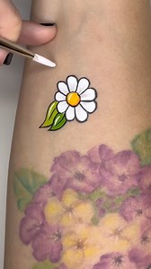 134K views · 1.7K reactions | How to paint an easy flower  I used WolfeFX face paint and Radiant KingArt brushes ️ Link in my bio & 1st comment  | Carolina The Doodler | Facebook