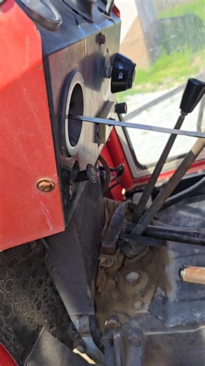 I couldn't find the tractor's ignition switch, so I started it using the dipstick.