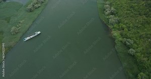 smooth rotation of the drone camera from top to bottom, ours towards the river and further to the Horizon