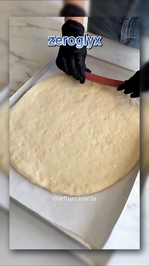 Bagel Pizza 🍕🧡 Ingredients Dough (200 ml water-glass measurement): 450 g flour (3 level cups 5 tbsp) 40 g flour (2 heaping tbsp) 10 g dry yeast 300 ml warm water (1.5 cups) 10 g granulated sugar (1 level tbsp) 10 g salt (1 tsp) 20 ml olive oil (2 tbsp) 1 egg Tomato Sauce: 1 grated tomato 1 tsp tomato paste 1 tsp ketchup 1 tbsp olive oil Thyme Salt Toppings: 5 sausages Sucuk Tomato Kashar cheese (Add any toppings you love!) Preparation Add yeast, sugar, and 2 tbsp flour into a bowl. Pour in the