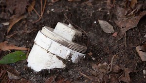 White Pipes in Your Yard? (What They Are & How to Hide Them)