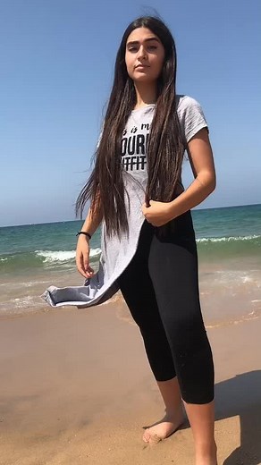 Burst of Energy at the Beach: Joyful Coastal Moments