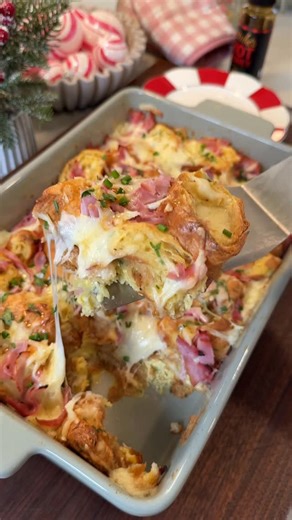 Victoria Tschopp on Instagram: "Christmas Morning Ham & Cheese Croissant Casserole🥐🍖🧀🎄😋 RECIPE: 12-15 mini croissants, cut in half (ideally day old croissants) 1½ cups ham, diced 1/3 cup gruyere slices 1 cup shredded gruyere 5 eggs 1 cup milk 1/2 cup half and half or heavy cream 1 tbsp Dijon mustard ½ tsp garlic powder ½ tsp salt ¼ tsp black pepper 1/4 cup chopped parsley Hot honey (optional) Preheat oven to 350°F. Grease a baking dish. Cut mini croissants in half and set aside. In a bowl,