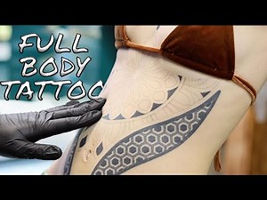 Geometric Elegance: Tuanna's Full Body Suit Reaches New Heights