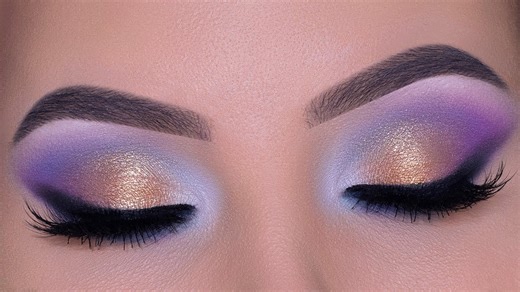 Bold golden smokey eye makeup with color accent