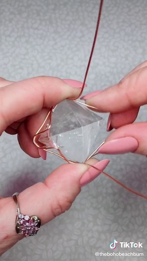 Reply to @mad.bunn How I wrap a pyramid #pyramid #quartzcrystal #wirewrappingtutorial #spiritualtiktok #howtowirewrap
