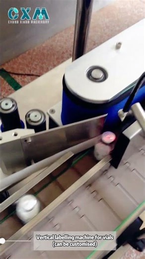 Vials vertical labeling machine